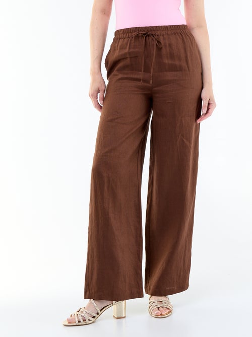 Pantalon large pour femme à taille élastiquée - Kiabi Pantalon large pour femme à taille élastiquée - Kiabi