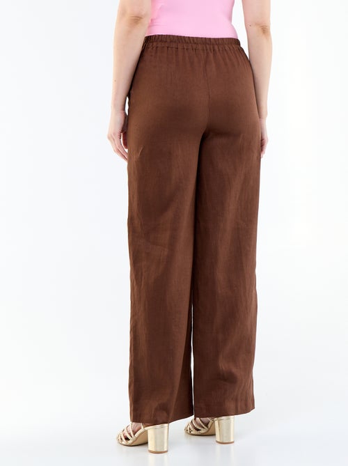 Pantalon large pour femme à taille élastiquée - Kiabi Pantalon large pour femme à taille élastiquée - Kiabi