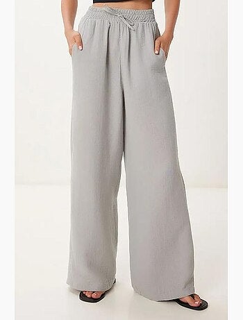 Pantalon jambes larges, taille élastique, cordon de serrage, finitions bordées istanbul