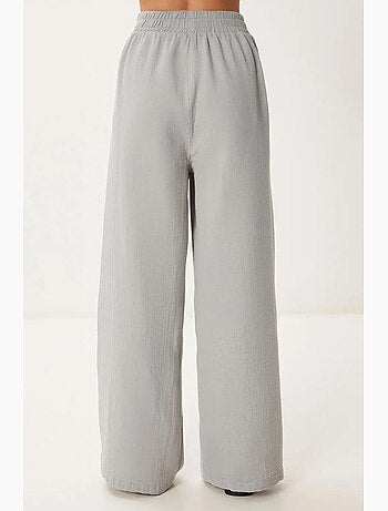 Pantalon jambes larges, taille élastique, cordon de serrage, finitions bordées istanbul