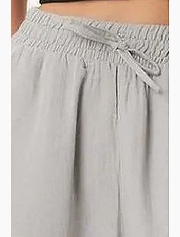 Pantalon jambes larges, taille élastique, cordon de serrage, finitions bordées istanbul