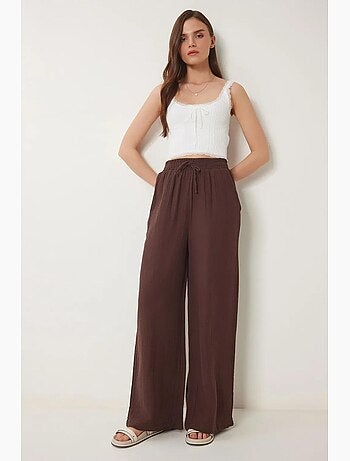 Pantalon jambes larges, taille élastique, cordon de serrage, finitions bordées istanbul