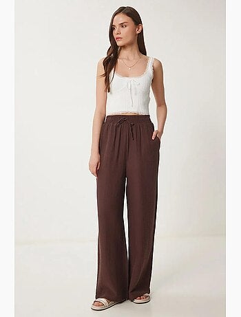 Pantalon jambes larges, taille élastique, cordon de serrage, finitions bordées istanbul