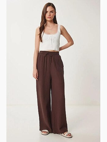 Pantalon jambes larges, taille élastique, cordon de serrage, finitions bordées istanbul