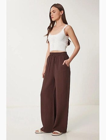 Pantalon jambes larges, taille élastique, cordon de serrage, finitions bordées istanbul