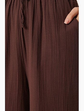Pantalon jambes larges, taille élastique, cordon de serrage, finitions bordées istanbul