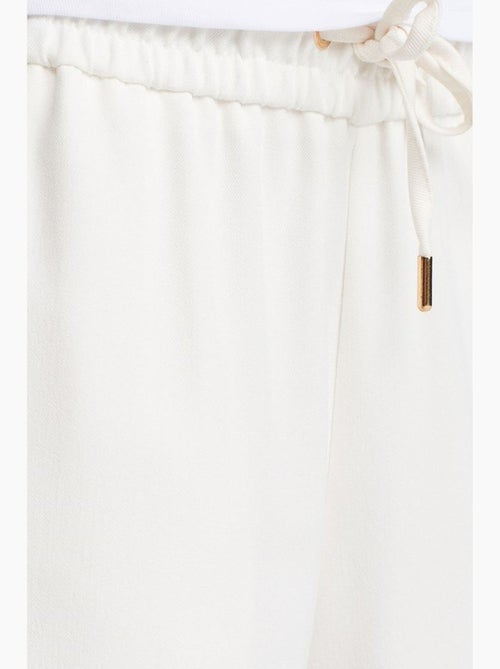 Pantalon large tissé à taille à cordon dilvin - Kiabi Pantalon large tissé à taille à cordon dilvin - Kiabi