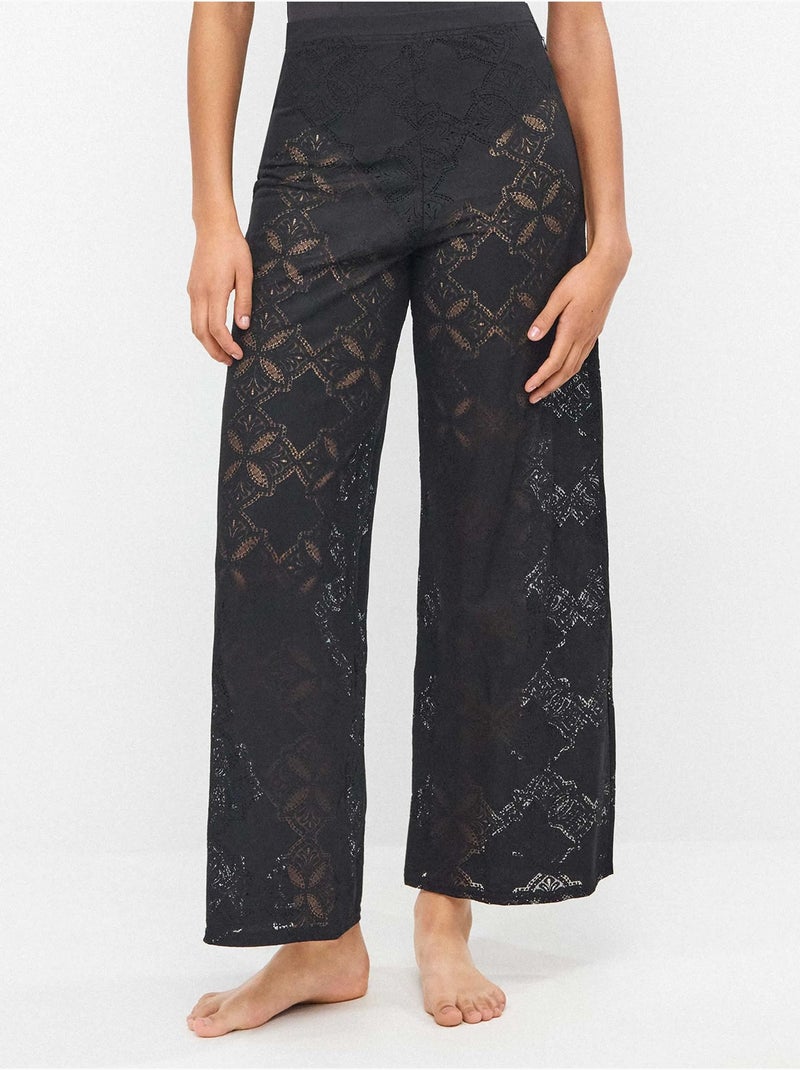 Pantalon long avec transparences édition beach party Noir - Kiabi