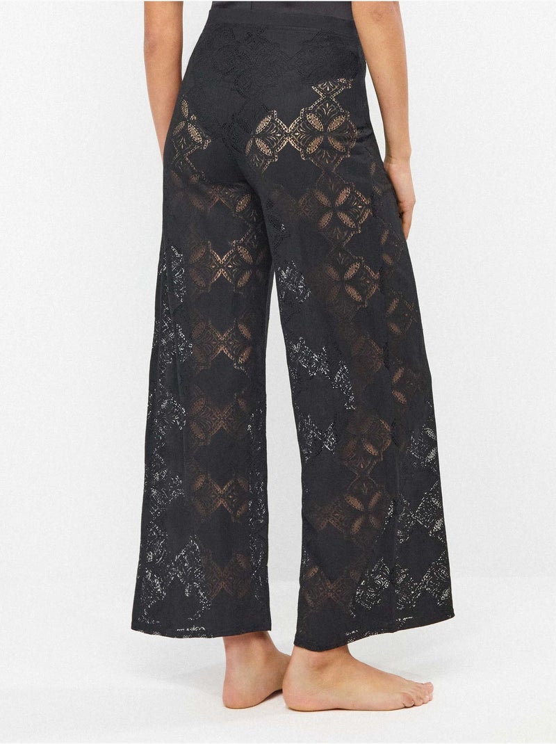 Pantalon long avec transparences édition beach party Noir - Kiabi