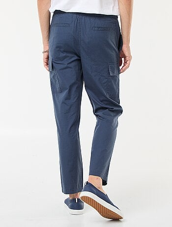 Pantalon multipoches avec ceinture élastiquée + cordons