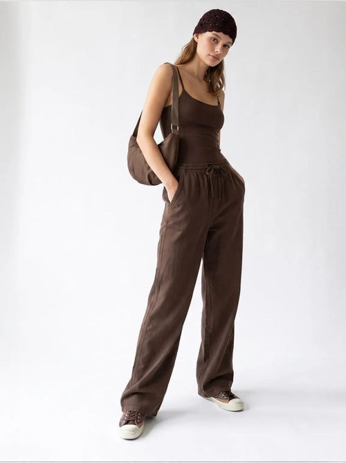 Pantalon palazzo à jambe large en tencel mixray - Kiabi Pantalon palazzo à jambe large en tencel mixray - Kiabi