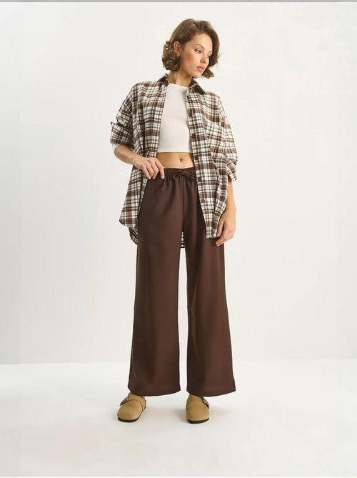 Pantalon palazzo à jambes larges et fermeture à nouer lucci - Kiabi