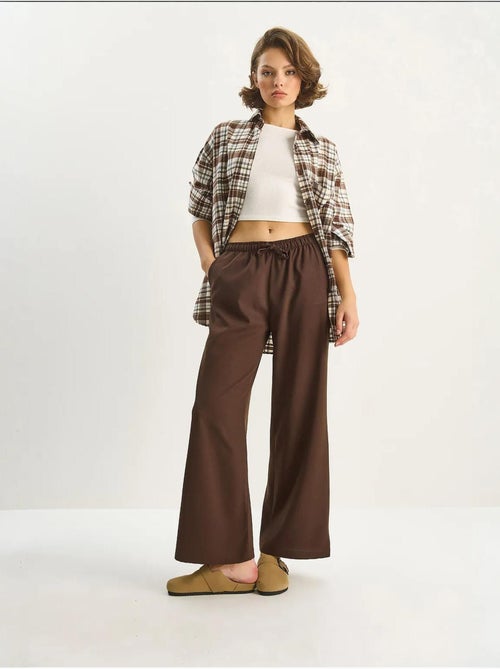Pantalon palazzo à jambes larges et fermeture à nouer lucci - Kiabi