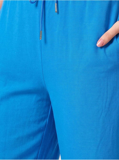 Pantalon palazzo avec cordon de serrage tommy - Kiabi Pantalon palazzo avec cordon de serrage tommy - Kiabi