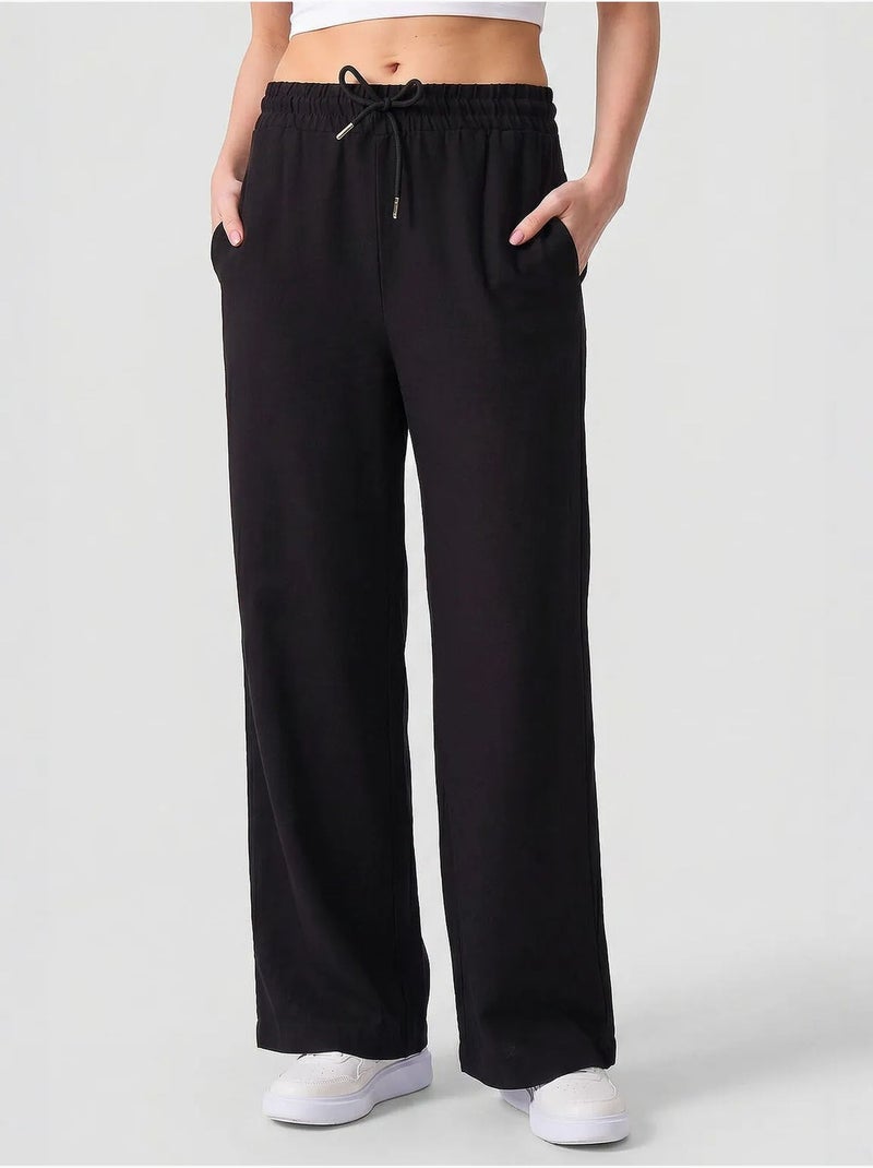 Pantalon palazzo avec cordon de serrage tommy Noir - Kiabi