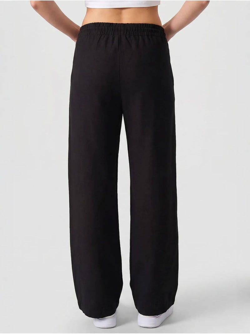 Pantalon palazzo avec cordon de serrage tommy Noir - Kiabi