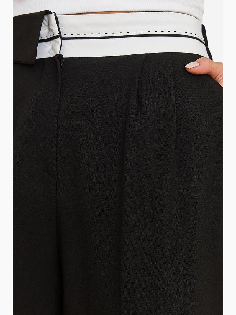 Pantalon palazzo boutonné à taille asymétrique et jambe large lucci Noir - Kiabi