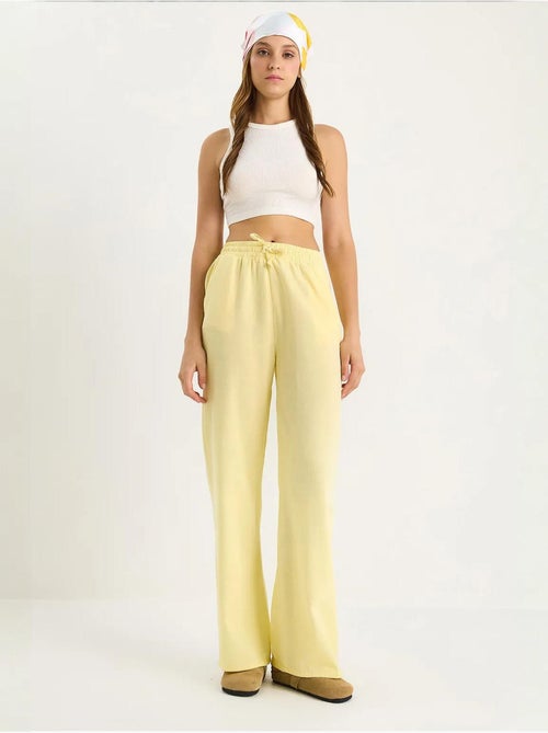 Pantalon palazzo en lin avec taille élastique et poches bianco lucci - Kiabi Pantalon palazzo en lin avec taille élastique et poches bianco lucci - Kiabi