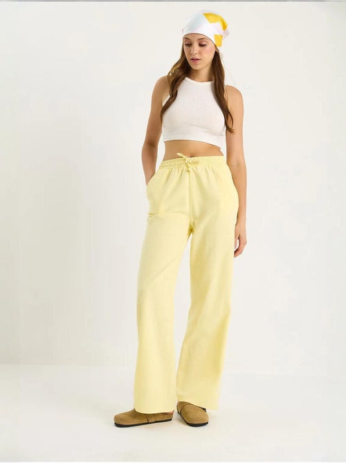 Pantalon palazzo en lin avec taille élastique et poches bianco lucci - Kiabi Pantalon palazzo en lin avec taille élastique et poches bianco lucci - Kiabi