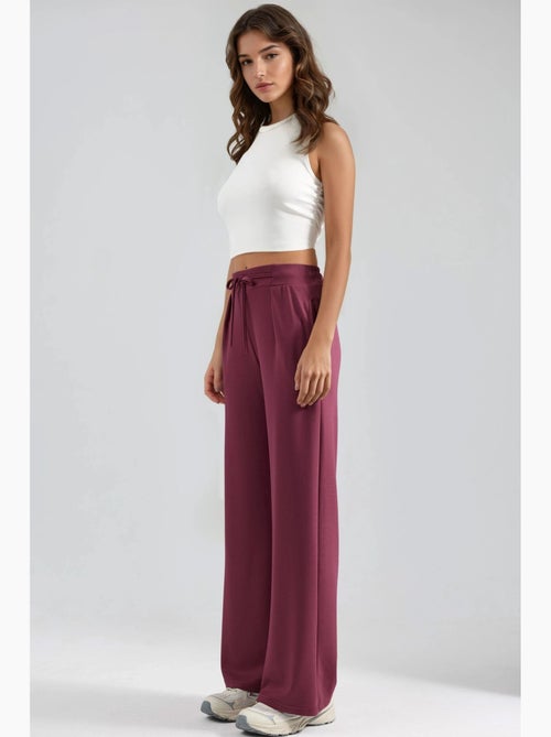 Pantalon palazzo plissé à jambes droites hiccup - Kiabi Pantalon palazzo plissé à jambes droites hiccup - Kiabi
