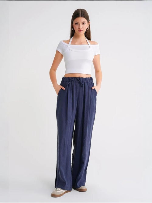 Pantalon palazzo plissé taille haute avec cordon de serrage mixray - Kiabi Pantalon palazzo plissé taille haute avec cordon de serrage mixray - Kiabi