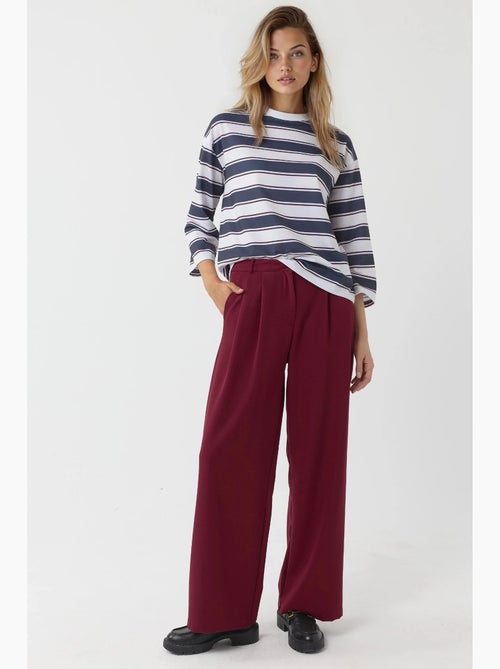 Pantalon palazzo plissé taille haute hiccup - Kiabi Pantalon palazzo plissé taille haute hiccup - Kiabi