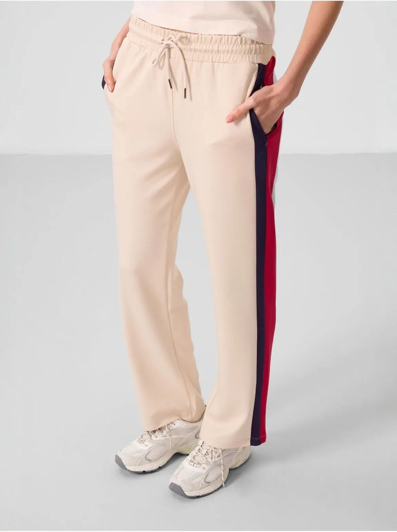Pantalon palazzo rayé avec taille à cordon tommy Beige argile - Kiabi