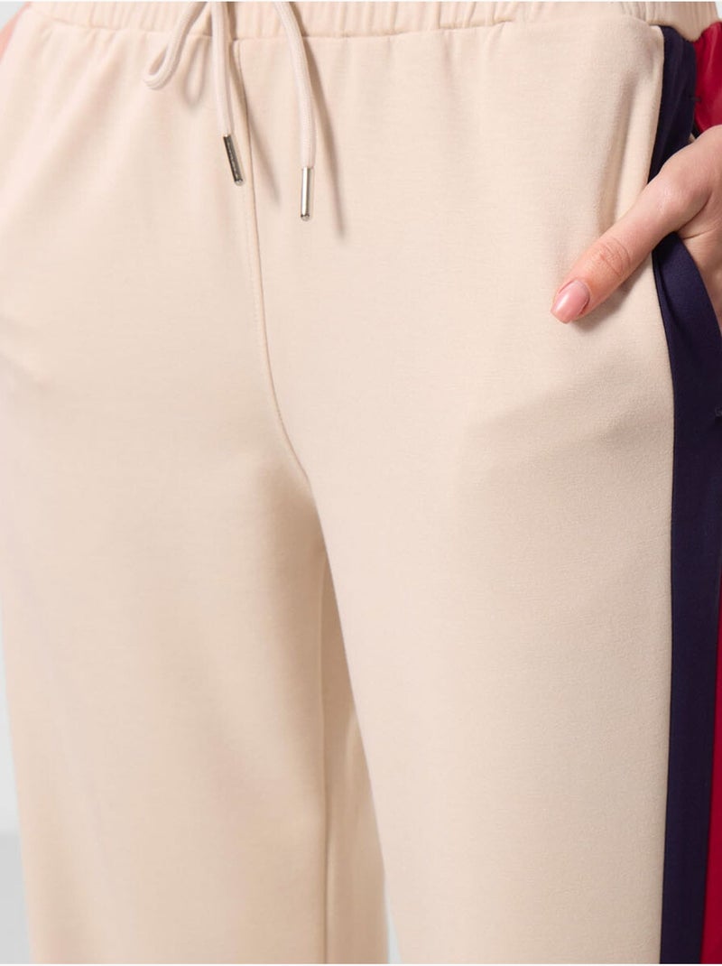 Pantalon palazzo rayé avec taille à cordon tommy Beige argile - Kiabi