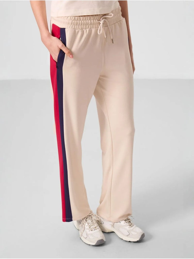Pantalon palazzo rayé avec taille à cordon tommy Beige argile - Kiabi