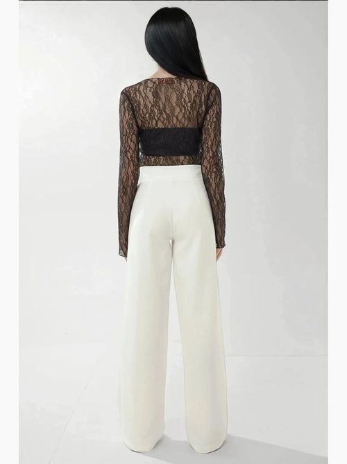 Pantalon palazzo taille haute à jambes larges hiccup - Kiabi Pantalon palazzo taille haute à jambes larges hiccup - Kiabi