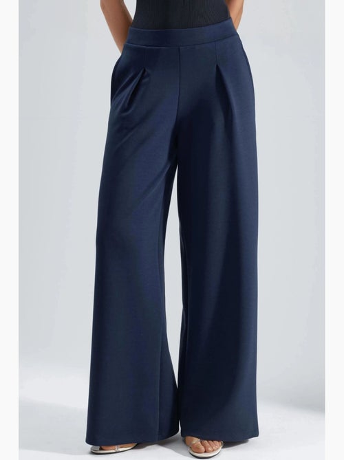 Pantalon palazzo taille haute avec élastique busem - Kiabi Pantalon palazzo taille haute avec élastique busem - Kiabi