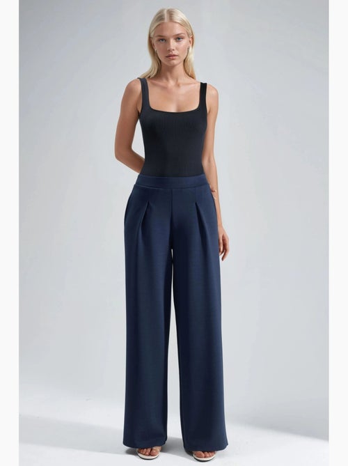 Pantalon palazzo taille haute avec élastique busem - Kiabi Pantalon palazzo taille haute avec élastique busem - Kiabi
