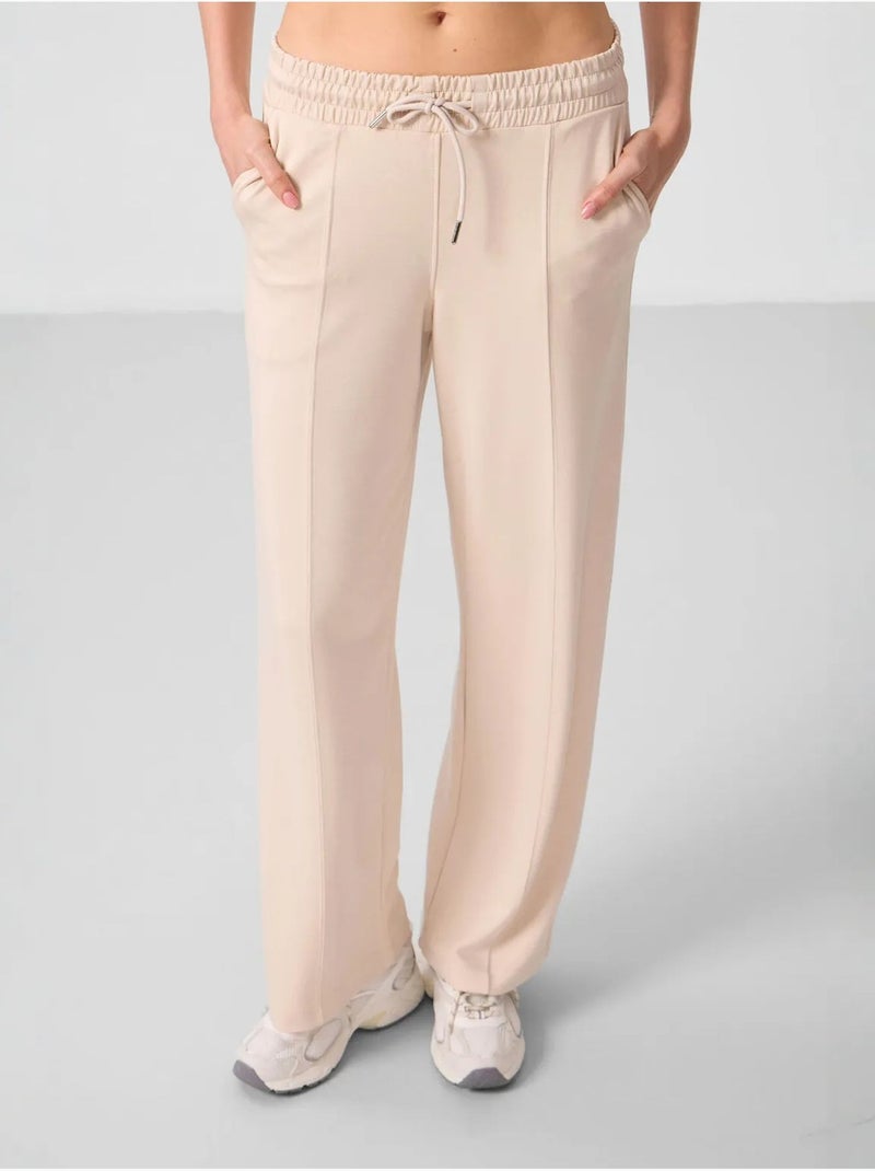 Pantalon palazzo texturé à jambes larges avec cordon de serrage à la taille tommy Beige argile - Kiabi