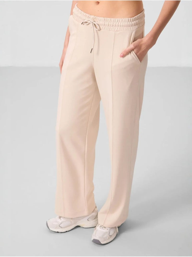 Pantalon palazzo texturé à jambes larges avec cordon de serrage à la taille tommy Beige argile - Kiabi