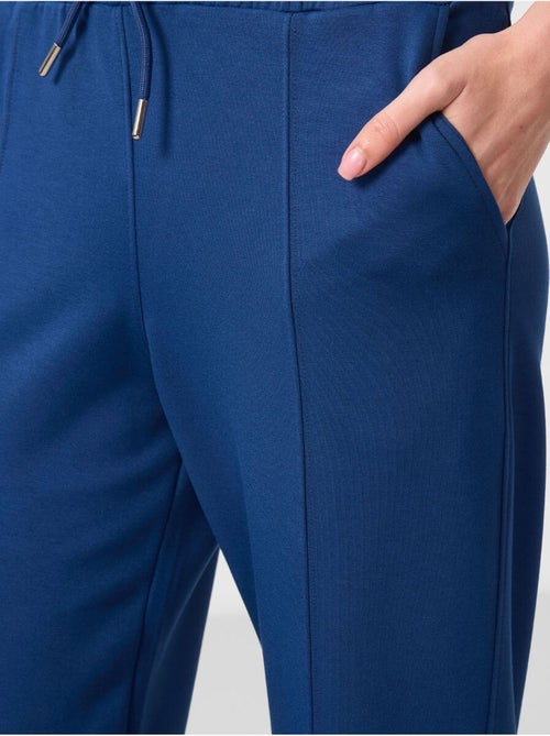 Pantalon palazzo texturé à jambes larges avec cordon de serrage à la taille tommy - Kiabi Pantalon palazzo texturé à jambes larges avec cordon de serrage à la taille tommy - Kiabi