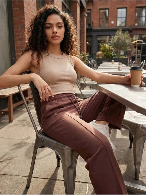 Pantalon palazzo texturé à jambes larges avec cordon de serrage à la taille tommy - Kiabi Pantalon palazzo texturé à jambes larges avec cordon de serrage à la taille tommy - Kiabi
