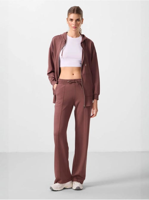 Pantalon palazzo texturé à jambes larges avec cordon de serrage à la taille tommy - Kiabi Pantalon palazzo texturé à jambes larges avec cordon de serrage à la taille tommy - Kiabi