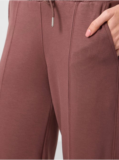 Pantalon palazzo texturé à jambes larges avec cordon de serrage à la taille tommy - Kiabi Pantalon palazzo texturé à jambes larges avec cordon de serrage à la taille tommy - Kiabi