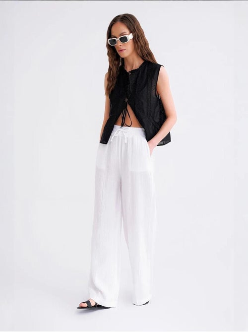 Pantalon palazzo texturé taille haute mixray - Kiabi Pantalon palazzo texturé taille haute mixray - Kiabi