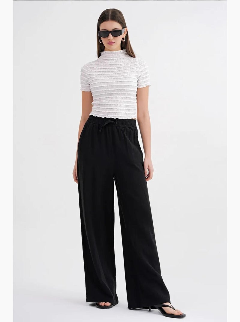Pantalon palazzo texturé taille haute mixray Noir - Kiabi