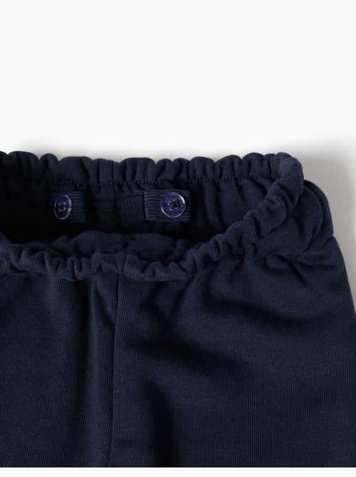 Pantalon paperbag en molleton avec nœud décoratif - Kiabi Pantalon paperbag en molleton avec nœud décoratif - Kiabi