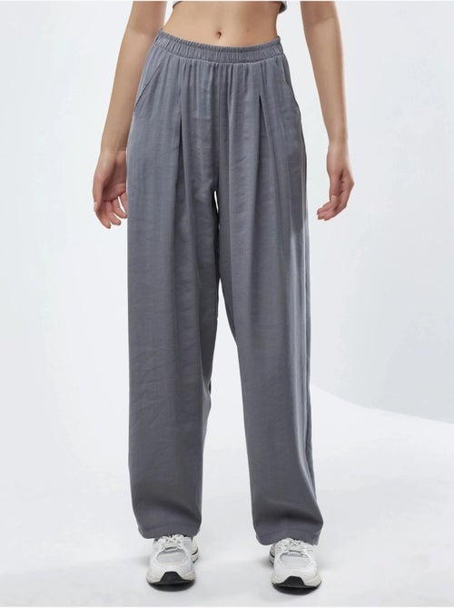 Pantalon plissé à jambes larges busem - Kiabi Pantalon plissé à jambes larges busem - Kiabi