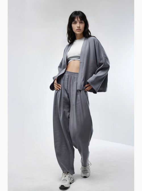 Pantalon plissé à jambes larges busem - Kiabi Pantalon plissé à jambes larges busem - Kiabi