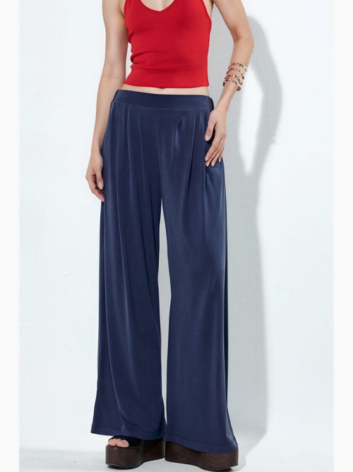 Pantalon plissé taille haute à jambes larges busem - Kiabi Pantalon plissé taille haute à jambes larges busem - Kiabi