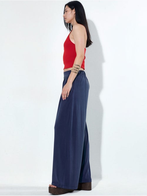 Pantalon plissé taille haute à jambes larges busem - Kiabi Pantalon plissé taille haute à jambes larges busem - Kiabi