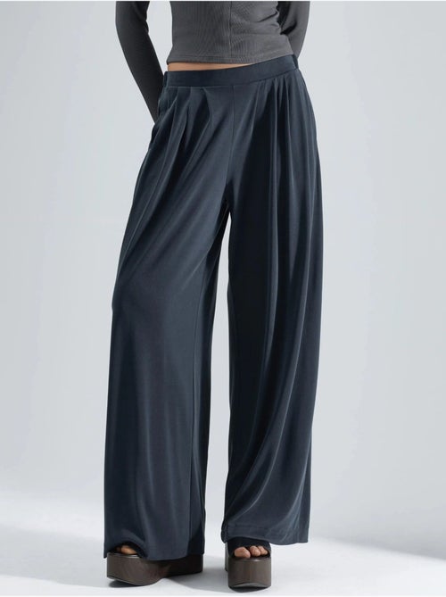 Pantalon plissé taille haute à jambes larges busem - Kiabi Pantalon plissé taille haute à jambes larges busem - Kiabi