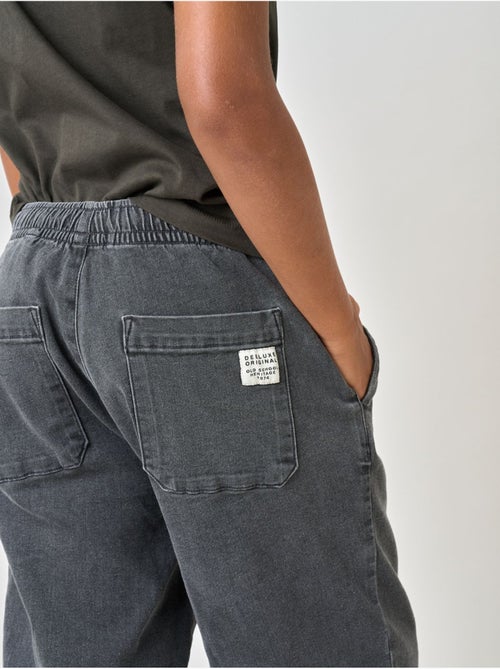 Pantalon relaxed garçon en coton denim 'deeluxe' - Kiabi Pantalon relaxed garçon en coton denim 'deeluxe' - Kiabi