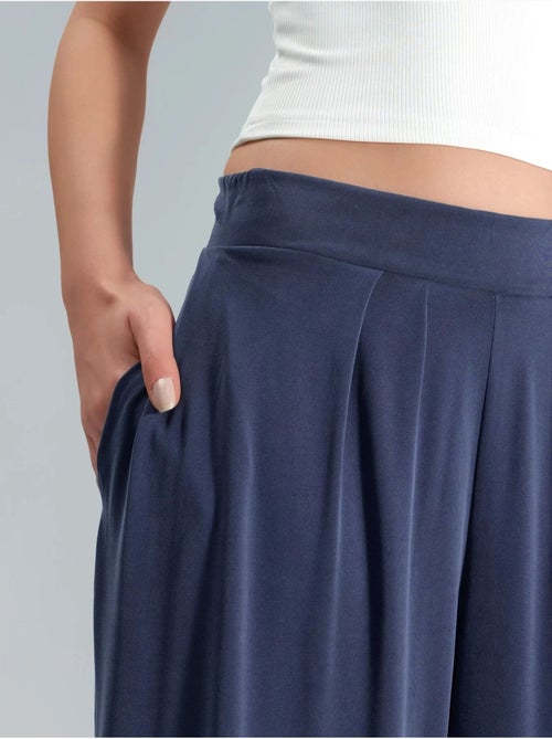 Pantalon salwar taille haute à jambes larges busem - Kiabi Pantalon salwar taille haute à jambes larges busem - Kiabi