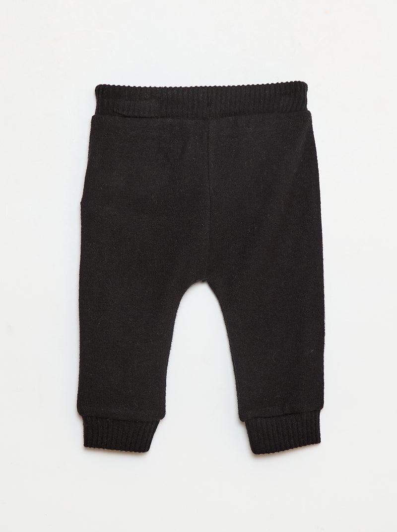 Pantalon sarouel en tricot uni Noir - Kiabi