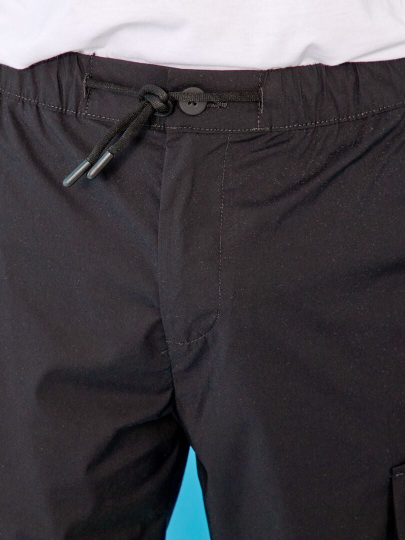 Pantalon slim avec poches sur les côtés noir - Kiabi